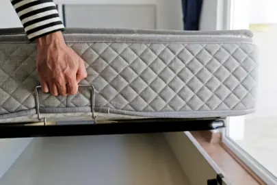 A mattress preparing to be stored.
