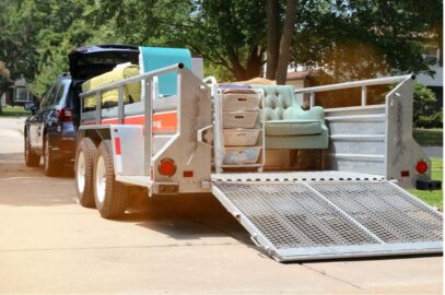 Moving items in the back of a trailer.