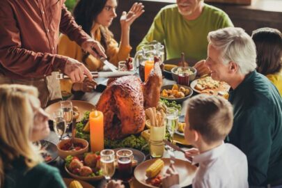 friends eating a thanksgiving dinner together